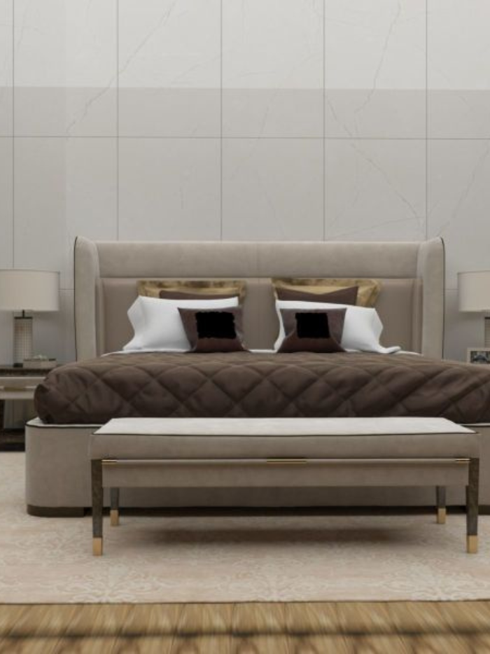 Modern bedroom with a large bed, nightstands, and lamps.