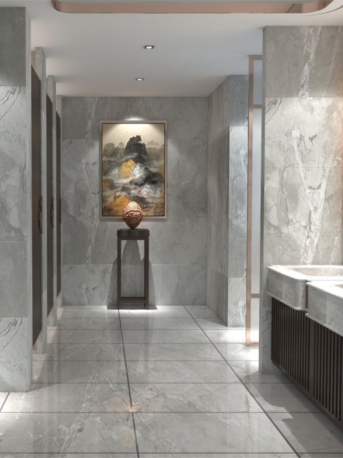 Modern bathroom interior with marble walls and floor, featuring a painting on the wall.