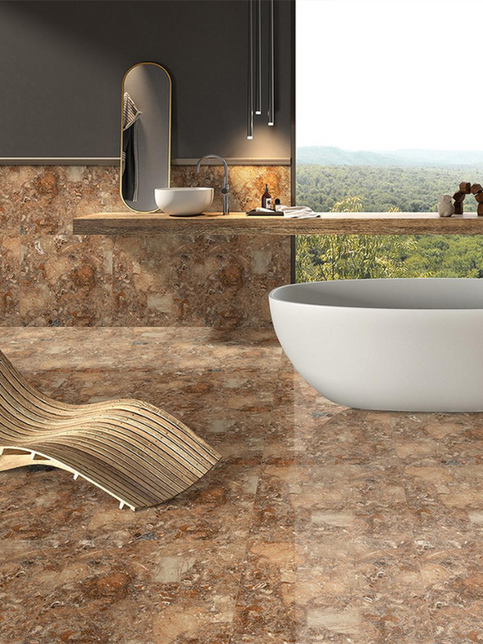 Modern bathroom with marble-like flooring and a view of greenery outside.