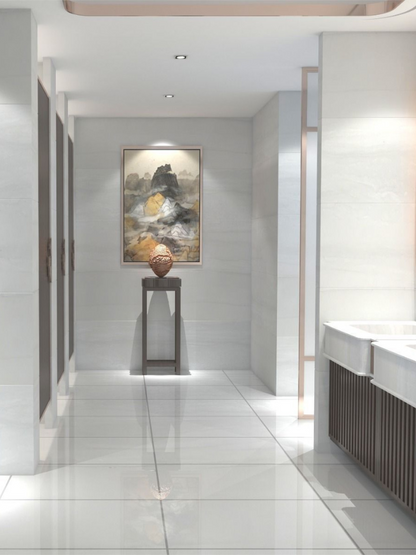 Modern hallway with a decorative painting on the wall and a small table with a spherical object.